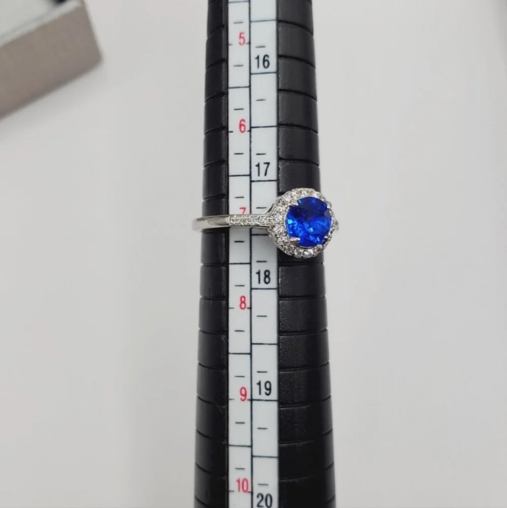 Blue Sapphire Simulant & Diamond Simulants Rhodium Plated Silver Tone Halo Ring